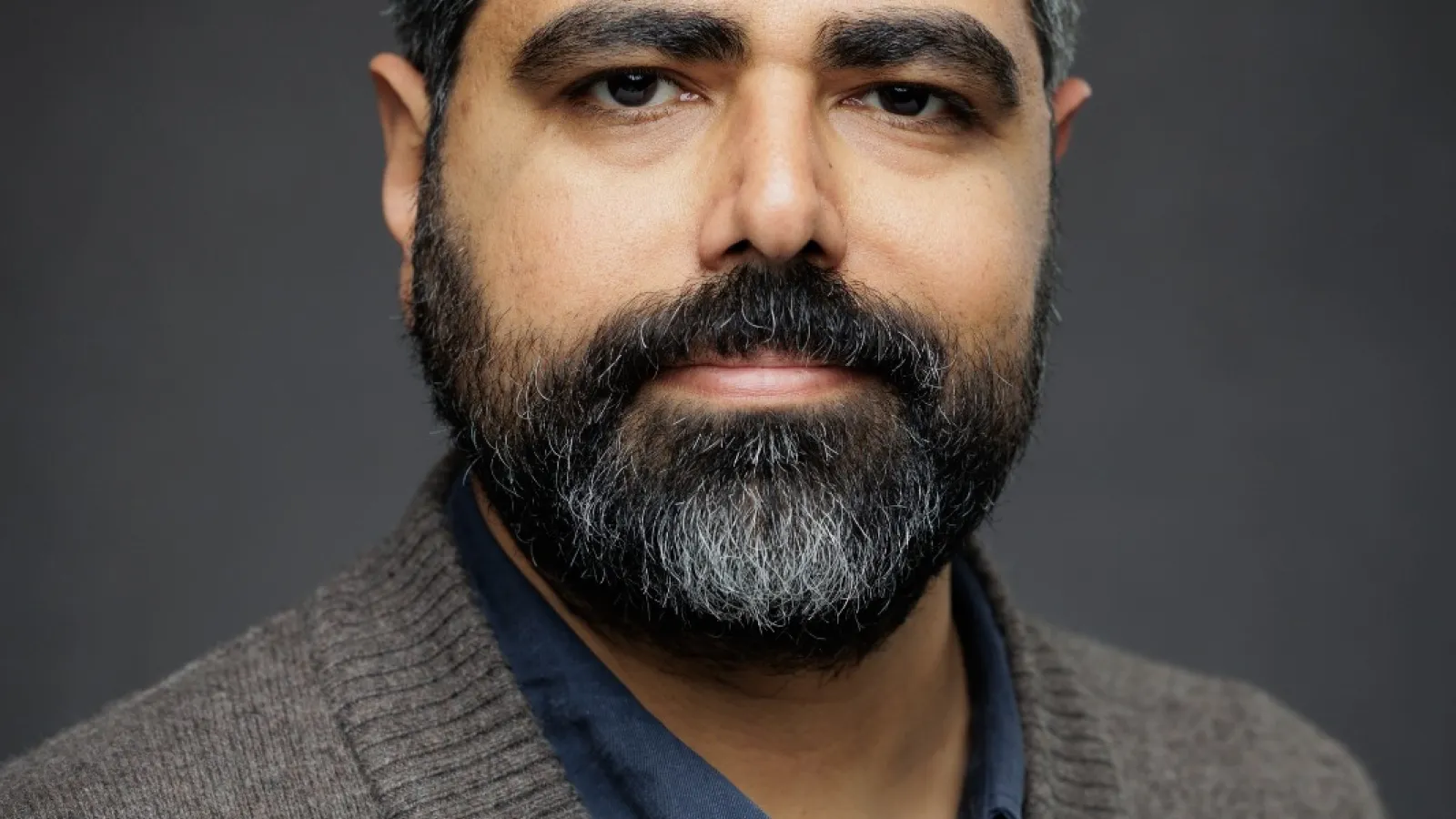 headshot of Serhun AL