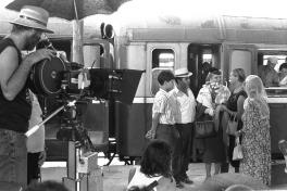Director Boaz Davidson looks through a camera at the old railway station in Jerusalem