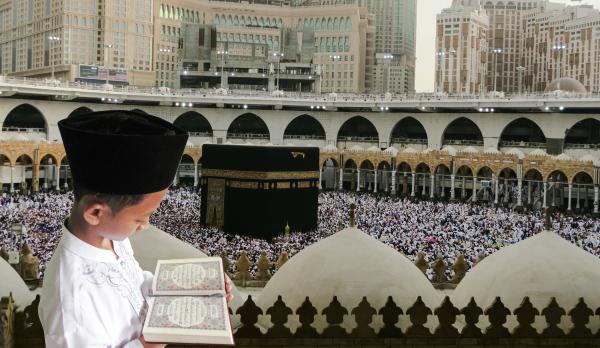Boy reading the Quran
