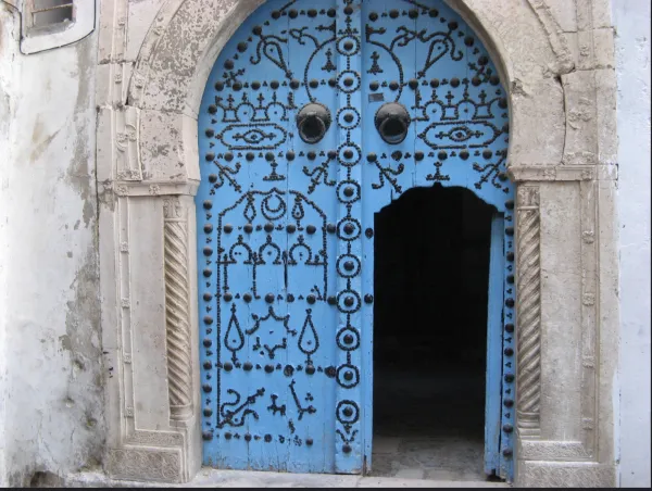 An open door with traditional painting 