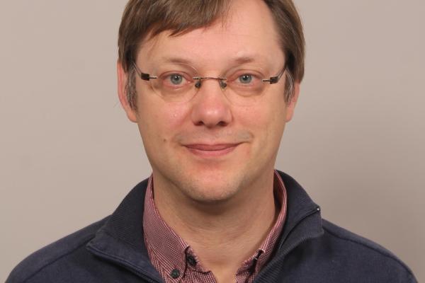 Dr. Kossmann