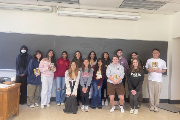 author with students