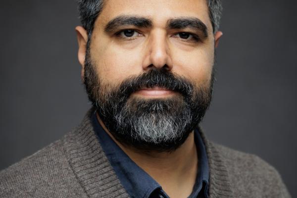 headshot of Serhun AL