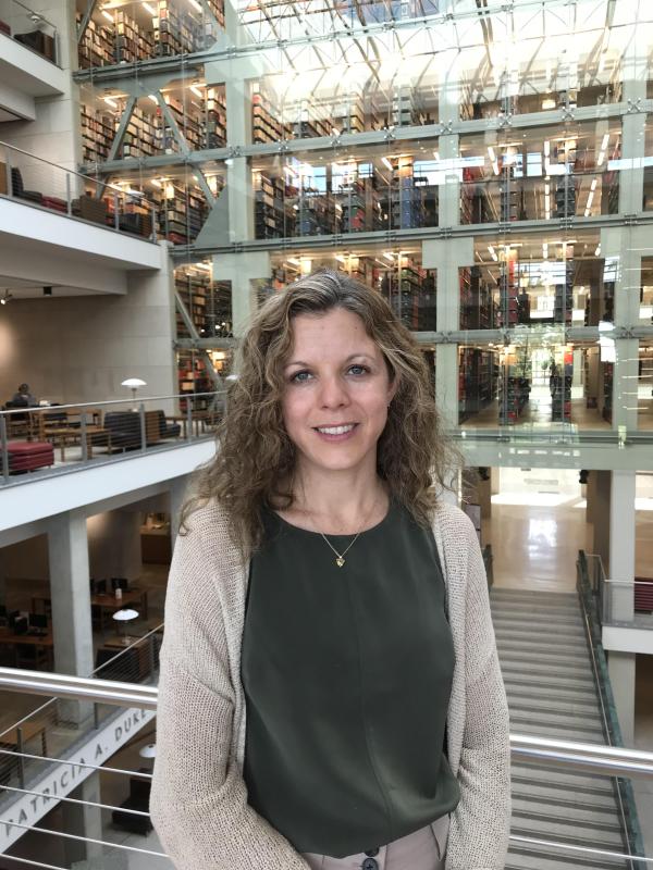 Photo of Johanna Sellman standing in Thompson Library. 