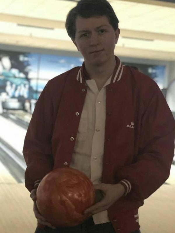 A picture of Gordon Goodwin in his bowling uniform, he is holding a bolding ball.