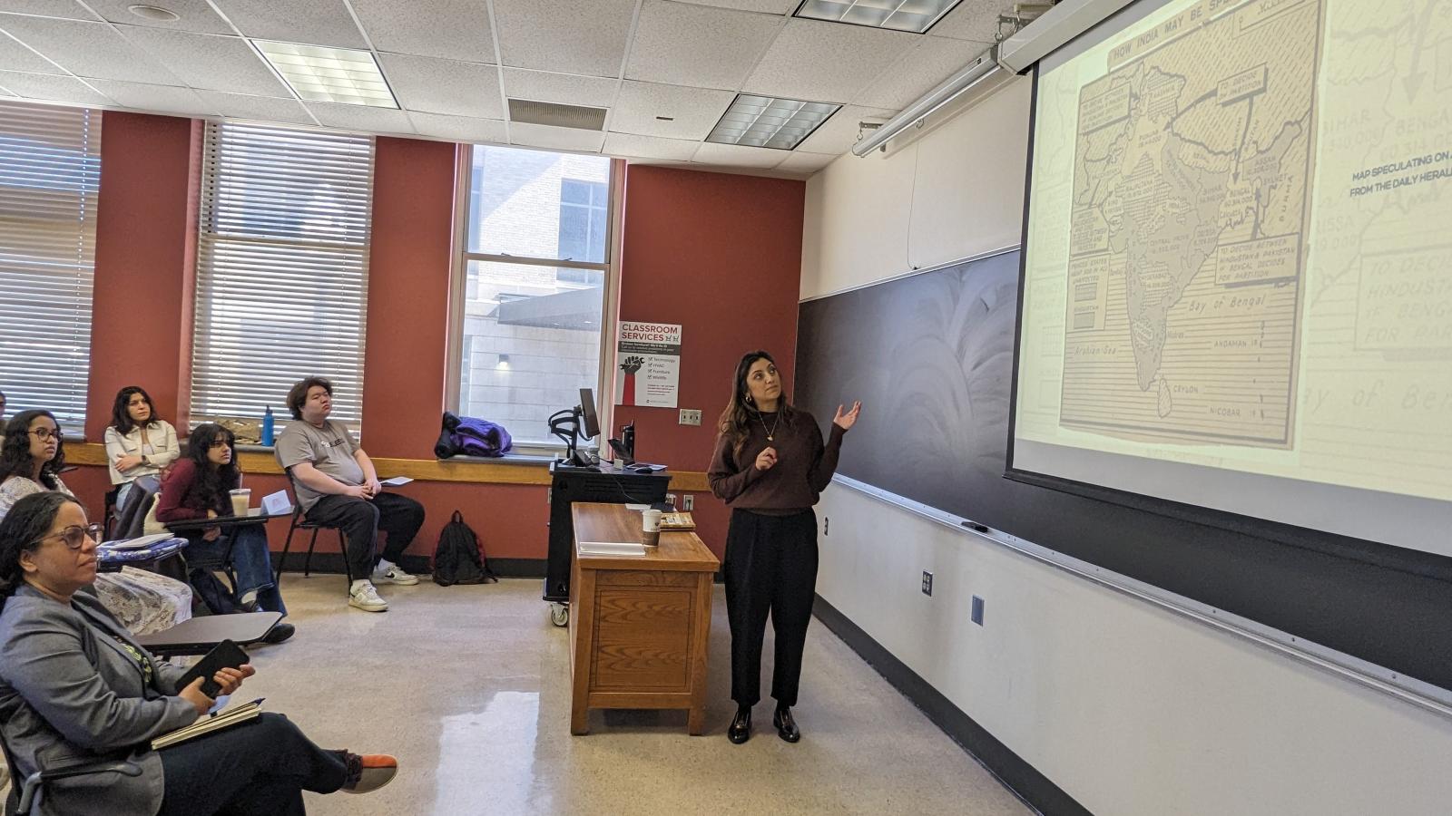 author presenting to students